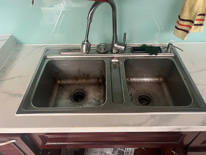 vệ sinh chậu rửa inox Konox